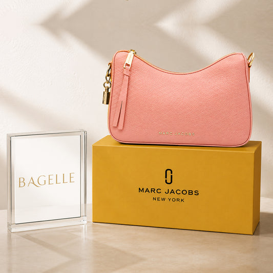 Pink textured shoulder bag front view