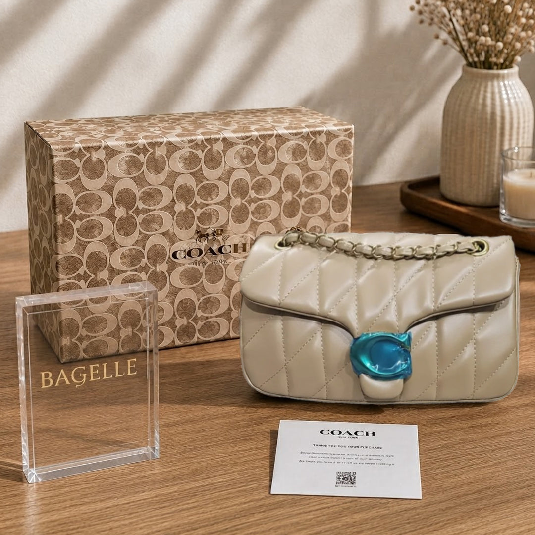 Taupe quilted chain shoulder bag front view
