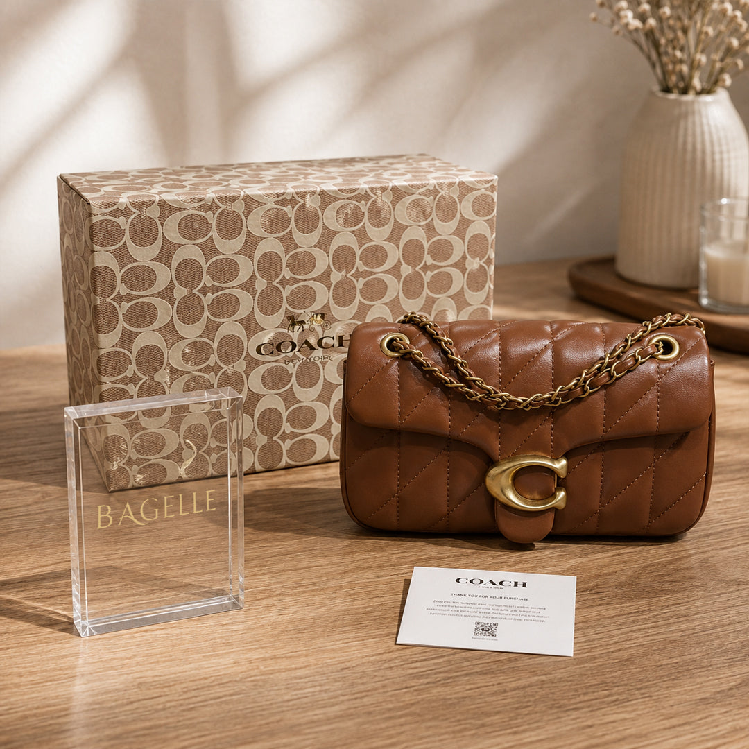 Brown quilted chain shoulder bag front view