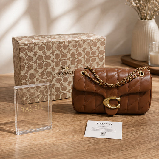 Brown quilted chain shoulder bag front view