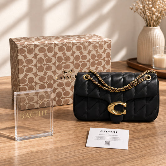 Black quilted chain shoulder bag front view